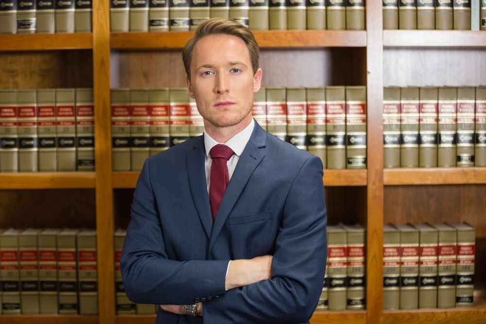 Lawyer,Frowning,In,The,Law,Library,At,The,University